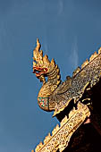 Chiang Mai - The Wat Phra Singh temple. Roof finial of the Viharn Luang (main prayer hall). 